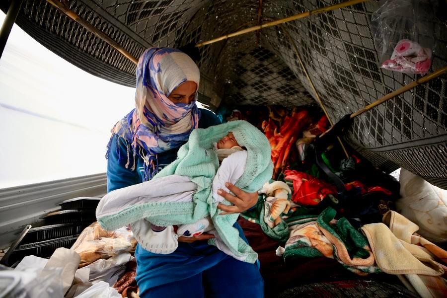 XHNews's tweet photo. Families displaced by Israeli airstrikes in southern Lebanon are spending Eid al-Fitr in difficult conditions, living in tents and shelters in Sidon, south of the capital Beirut. https://t.co/CfESsNcjSd #FromTheFrontline https://t.co/QomTk66rMT