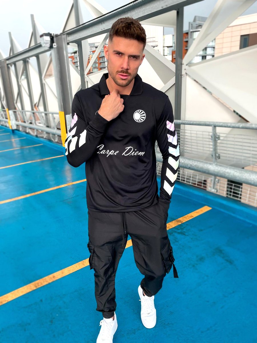 Rayelleuk's tweet photo. Seize the day in our Black Retro Football Jersey. A classy design with a unique pastel arrow print on the sleeves. ONLY £9 in our Closing Down Sale! Buy 3 Get 1 Free on EVERYTHING! At https://t.co/eUvDQbn4iV ❕ https://t.co/y8jHdCl5Cd