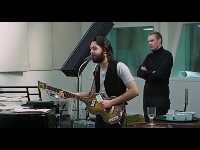"It's hopeless trying to produce The Beatles. No one can do it. The four individuals are too strong individually." - Paul McCartney while George Martin sits behind him
