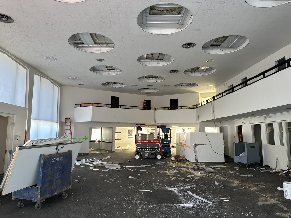 Here's a fixture you don't see every day...a light well! These electrical features are a fixture on top of a fixture, with multiple smaller components covered by 1 large piece that makes the whole system appear as one large fixture. Stay tuned to see how the new ceiling looks!