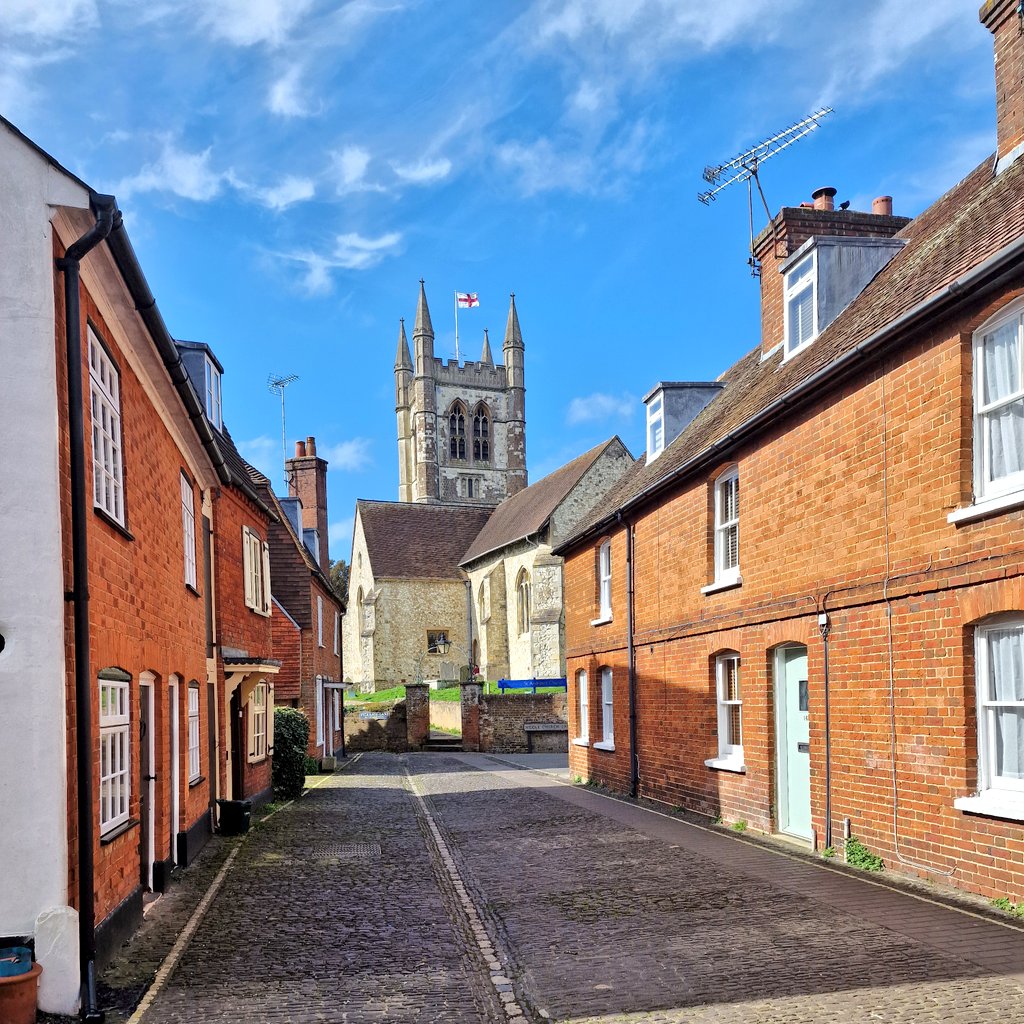 StroudStory's tweet image. Sunshine and shadow in Farnham, #Surrey, for #SteepleSaturday, with St Andrew's foursquare tower and chonky finials against a blissfully blue sky - idyllic? Not quite: out of view are barricades around the church!