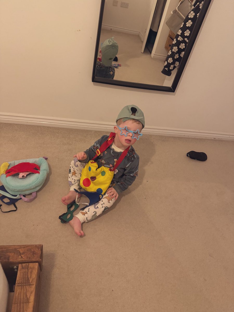 twmbach27's tweet photo. Happy World Down Syndrome Day everyone! I hope you enjoy your day as much as George loves every day! #RockNRollStar #WorldDownSyndromeDay2026 🧦 https://t.co/JekwfsW7OA