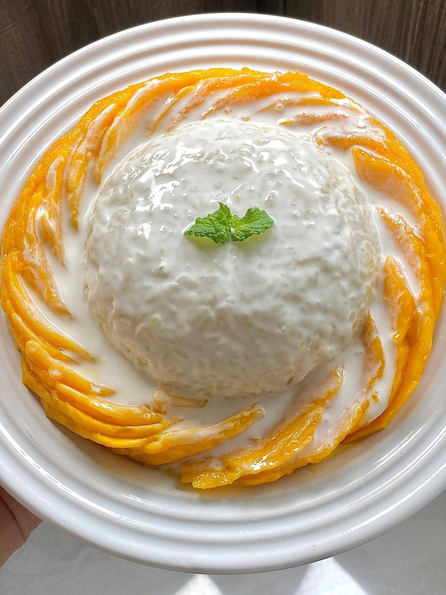 Muhamma97114633's tweet photo. Try our Thai Mango Sticky Rice—sweet ripe mango, creamy coconut rice, drizzled with coconut sauce! A tropical bite of heaven in every spoon.  #ExoticEats #ThaiCuisine https://t.co/RzZsMk6B8t