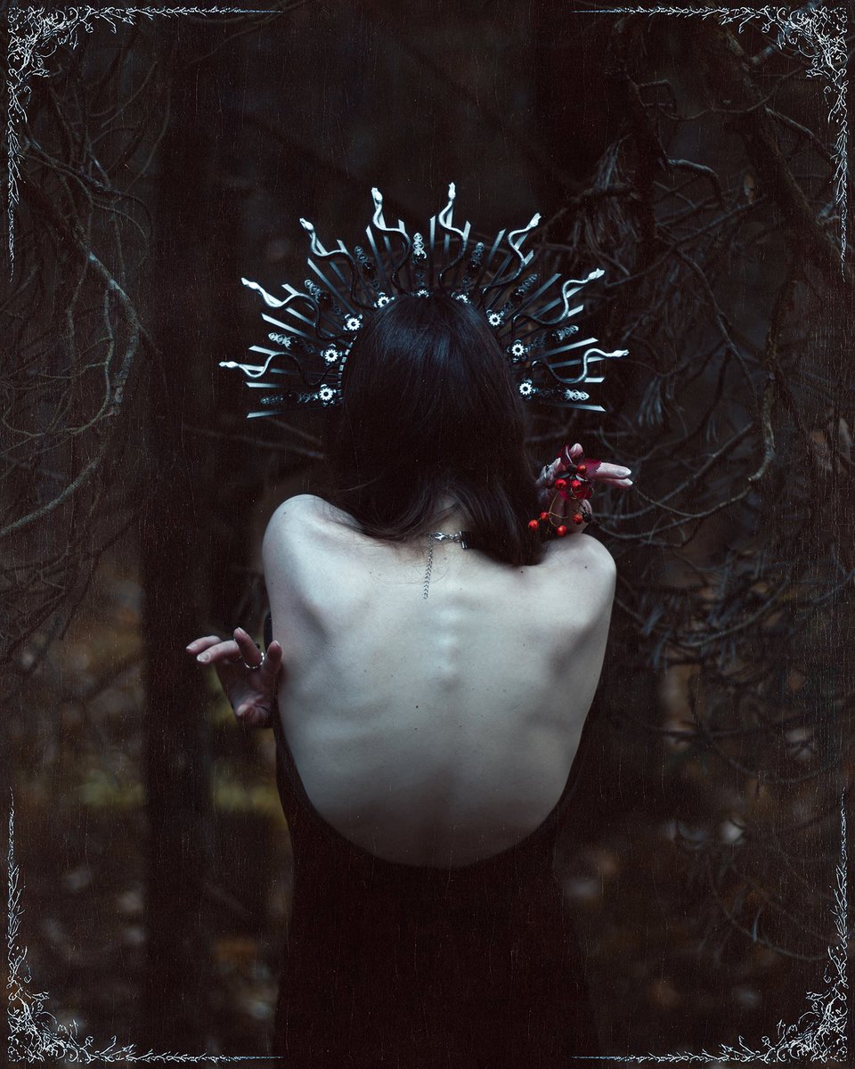 The forest held its breath — pale skin, black velvet, a crown of cold metal... Autumn watched in silence as she returned to its heart, carrying a drops of blood between her fingers.

Crown by Cos.ucos
Self-Portrait
Autumn 2025