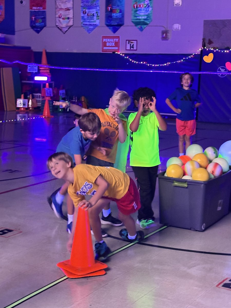TheCoachFuller's tweet photo. It is so much work to set up but so worth it to hear the excitement! It’s the MHE @kidsheartchallenge Glow Celebration! All week in PE we will be celebrating our school wide efforts that helped us raise over $48,000 for @american_heart . Way to go Mustangs! #mhepe #risdmoves #physed #risddreambig