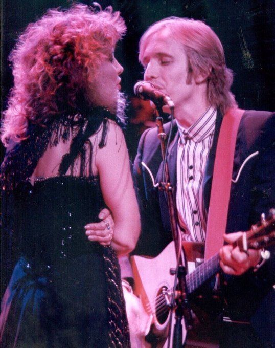 crockpics's tweet photo. Stevie Nicks and Tom Petty performing their duet "Stop Draggin' My Heart Around" at the Cow Palace in Daly City, California, on June 26, 1981. The photo was taken by Larry Hulst. The track was the lead single from Nicks' debut solo album Bella Donna (1981) and was a massive hit, peaking at No. 3 on the Billboard Hot 100 chart.