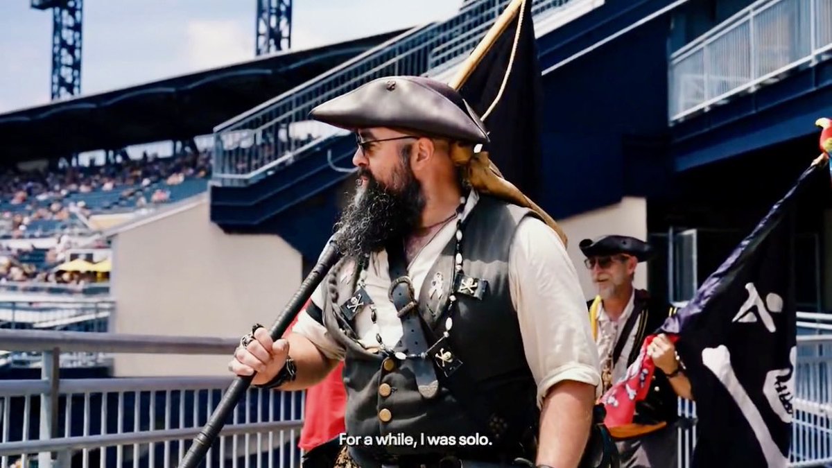 Paul Skenes looking at his teammates