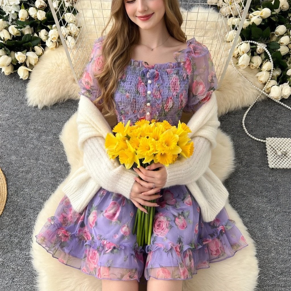 merchedbeca's tweet image. Lavender dreams meet Welsh rebellion, This soft lilac rose dress dances in layers of sheer tulle—puff sleeves, pearl buttons, pure romantic fire. Wrap the white shawl, clutch those daffodils, and bloom. Own Your Power! merchedbeca.com #MerchedBeca #SpringRebellion