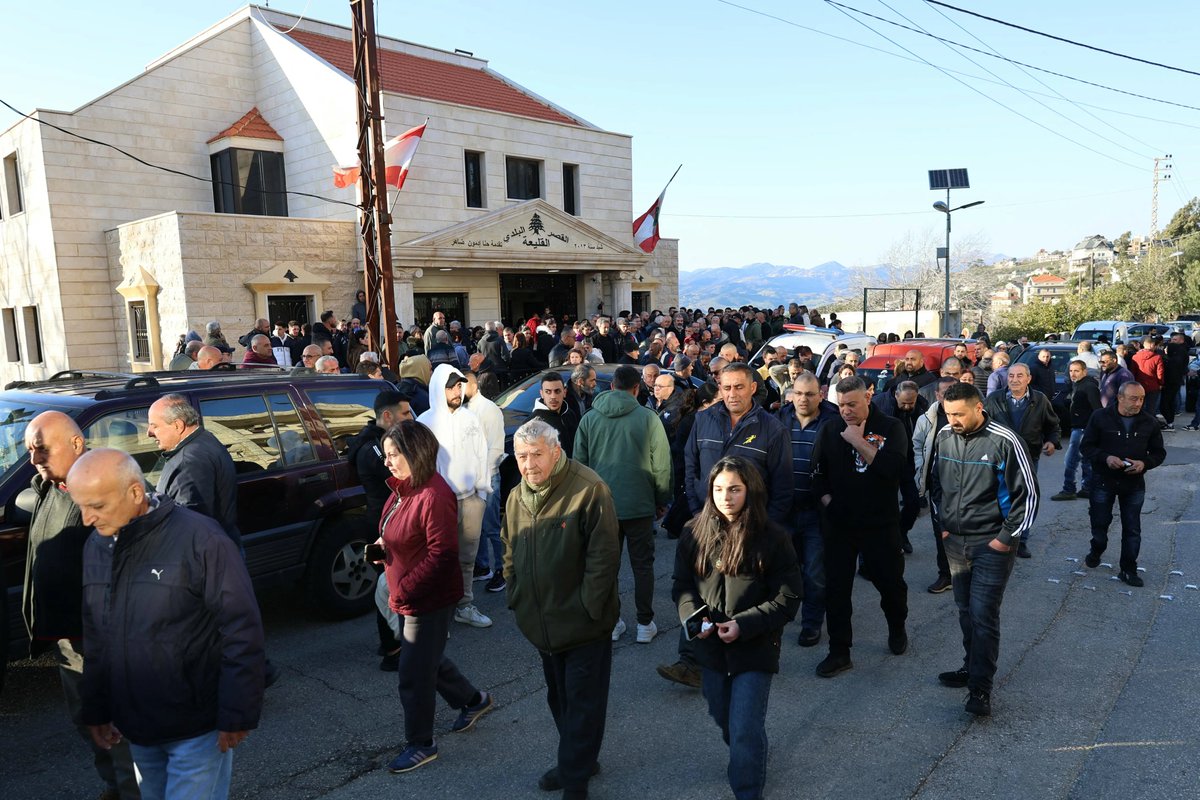 AJEnglish's tweet photo. Residents of the Lebanese border town of Qlayaa gather to mourn local Maronite Catholic priest Father Pierre al-Rahi after he was killed by Israeli forces.

🔴 LIVE updates: https://t.co/hvQPTuUE2G https://t.co/2bCux4f7Mk