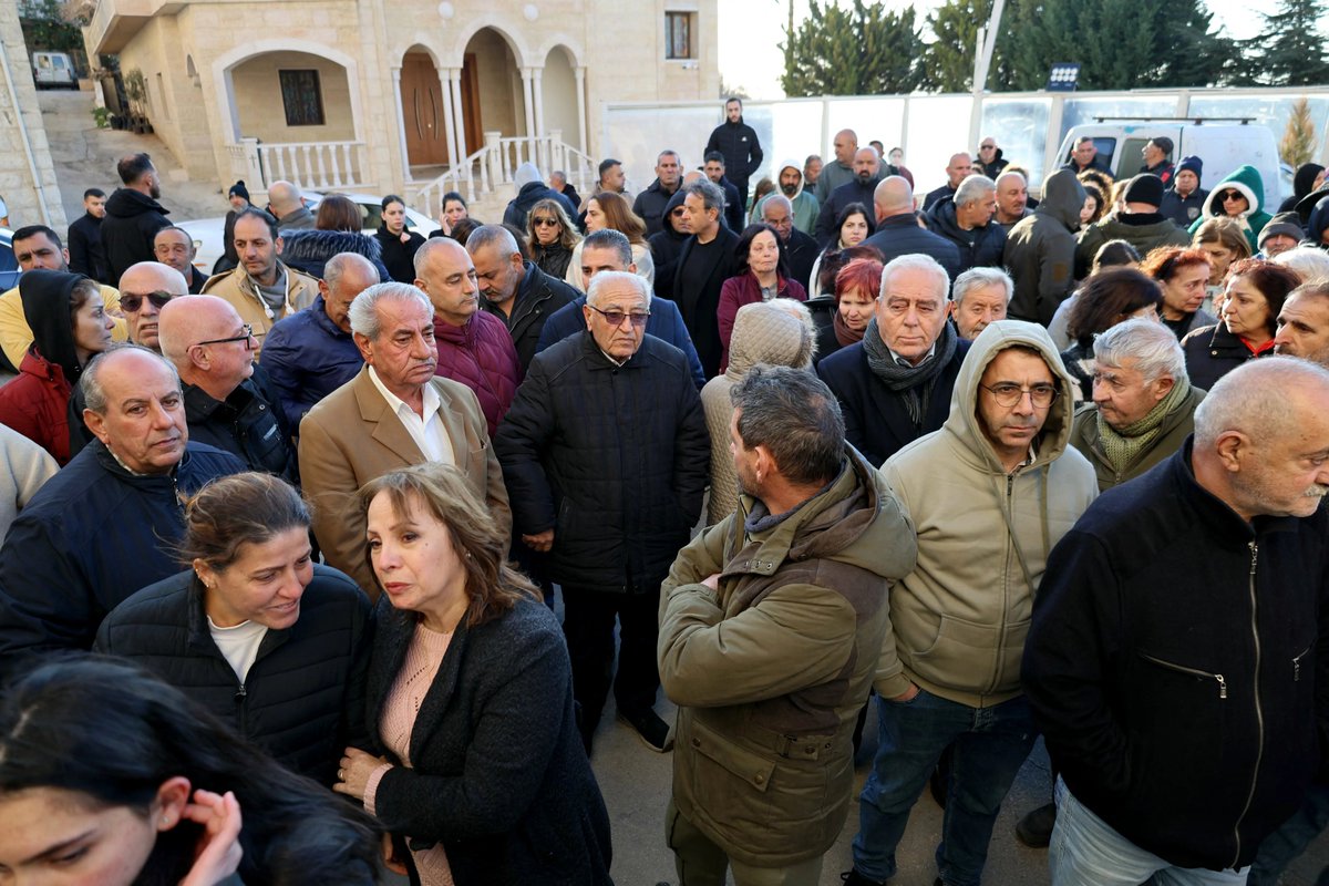 AJEnglish's tweet photo. Residents of the Lebanese border town of Qlayaa gather to mourn local Maronite Catholic priest Father Pierre al-Rahi after he was killed by Israeli forces.

🔴 LIVE updates: https://t.co/hvQPTuUE2G https://t.co/2bCux4f7Mk