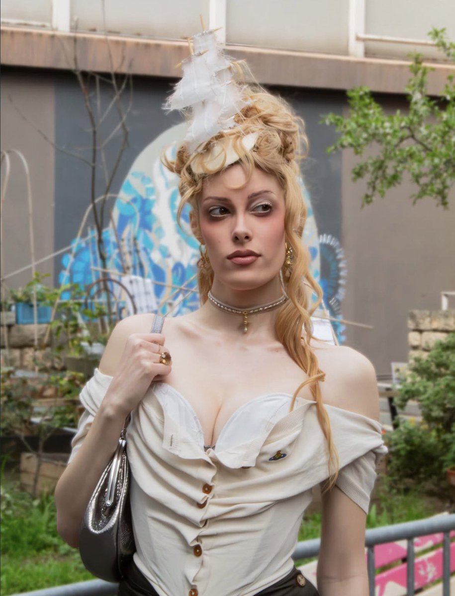 Gigi Goode looks angelic for the Vivienne Westwood AW 2026/27 fashion show in Paris, France.