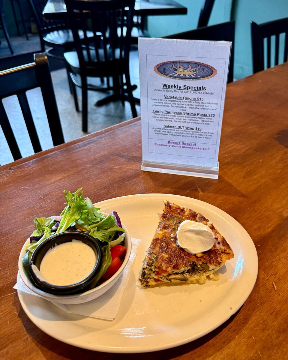 Vegetable Quiche $15
Enjoy a savory vegetable quiche with a flaky crust filled with sauteed onions, red peppers, tender spinach and rich Gruyere cheese. Served with a choice of a salad or cup of soup.