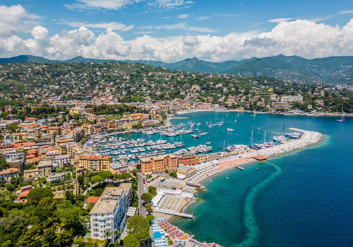 Start Making Plans: istockphoto.com/portfolio/bob_… #Italy #Europe #SantaMargherita #summer #vacation #travel #mountains #beach #sand #port #marina #boats #sailboats #cove #gettyimages #aerial #travelpics #travelphotos #town #village #coast #coastal #clouds #blue #sky #stockphotography