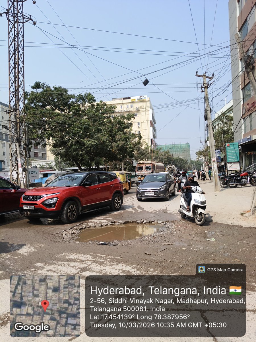 NapQueenMee's tweet photo. 🚧 Severe Road Damage &amp; Pothole Issue in Madhapur – Immediate Attention Required

Dear @GHMCOnline @MC_Cyberabad @CMC_Offcl

A large pothole filled with water is causing inconvenience and posing a serious risk to commuters at 2-56, Siddhi Vinayak Nagar, Madhapur, Hyderabad. https://t.co/o2VrTU0atI