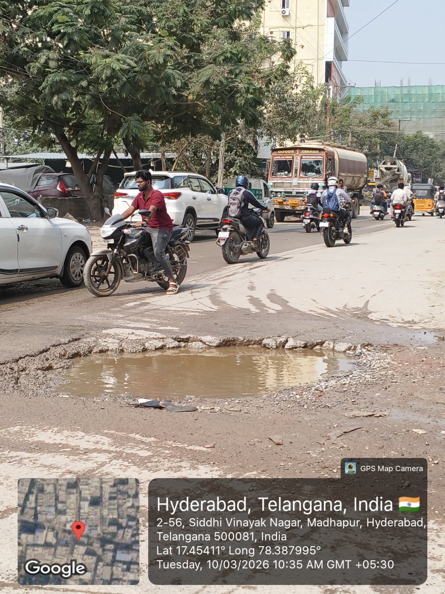 NapQueenMee's tweet photo. 🚧 Severe Road Damage &amp; Pothole Issue in Madhapur – Immediate Attention Required

Dear @GHMCOnline @MC_Cyberabad @CMC_Offcl

A large pothole filled with water is causing inconvenience and posing a serious risk to commuters at 2-56, Siddhi Vinayak Nagar, Madhapur, Hyderabad. https://t.co/o2VrTU0atI