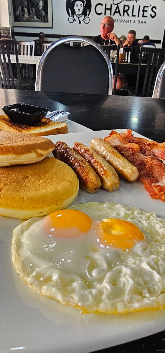 I LOOOOOVE Thai food, and can't imagine living without it. There is a time when I have cravings for foreign food. One of my favorite places is Cheap Charlie's.  
Large American breakfast. Bacon, eggs, sausage, and fluffy pancakes. 
Mmmmmmmmmm