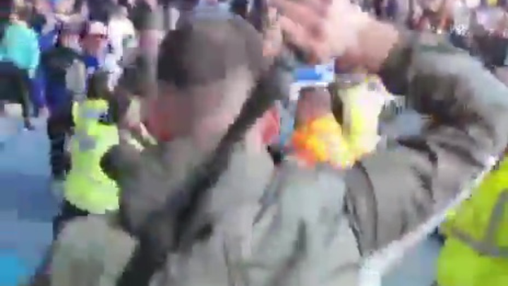 scotsunsport's tweet photo. Unseen moment Celtic fan strikes Rangers supporter with a BELT after punches thrown in shocking confrontation at Ibrox

https://t.co/HGLCoFzOxO https://t.co/ds3U9Qif7M