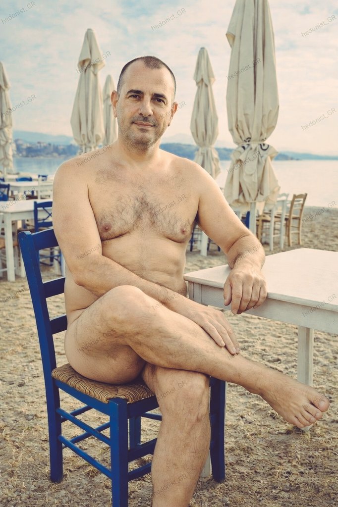 Nikos stealing the quiet hour. Naked pause at the ouzeri before the world wakes up. Pure peace! 🇬🇷 #naturist #nudist #naturism #nudism #nudismo #fkk #couple #γυμνιστης #γυμνισμος #publicnudity #publicbeach #normalizenaturism #friend #greece #eviaisland