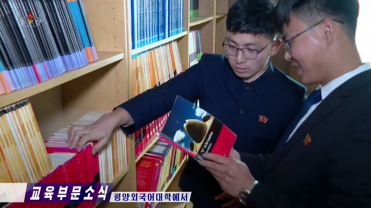 NKResearcher's tweet photo. #NorthKoreans at Pyongyang Foreign Languages University looking at Sue Grafton's novel "L" Is for Lawless and likely many other English novels. Shown yesterday on KCTV evening news. We already knew they use Disney movies for language training. https://t.co/CkEqRO4060