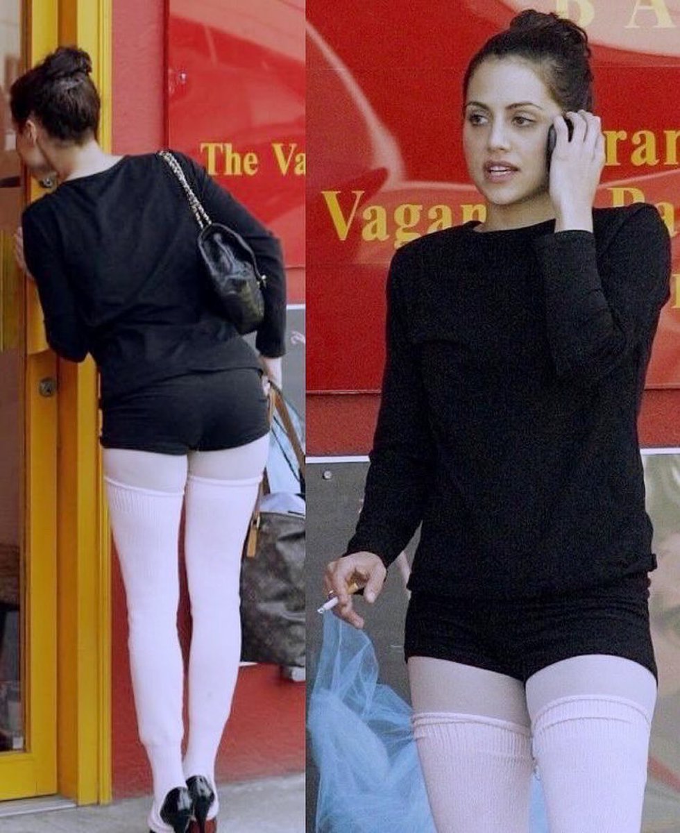 brittany murphy at ballet class wearing pink leg warmers, louboutins, a chanel purse, and a louis vuitton bag, 2005