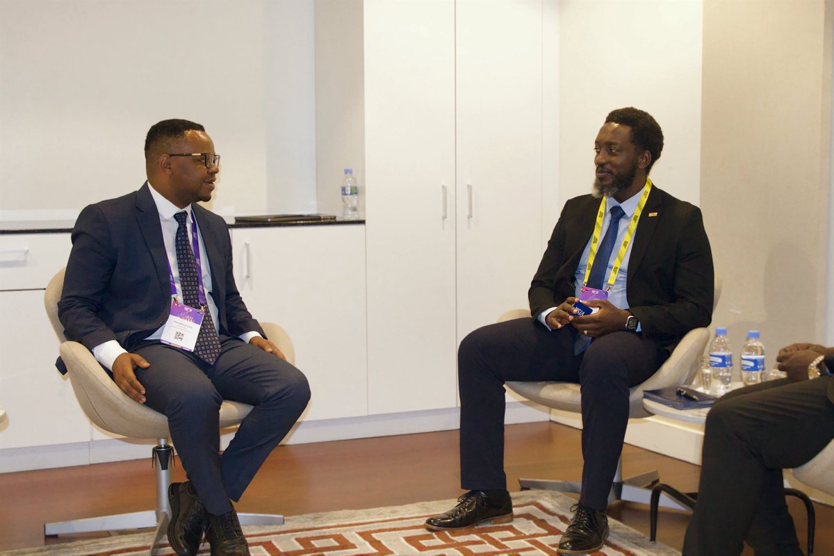 RwandaICT's tweet photo. On the sidelines of #IFF2026, Minister of State @yves_Iradukunda held a bilateral meeting with Mr. Zach Munyi, Director of Government Affairs at Visa, and Mr. Victor Makere, Visa Country Manager overseeing operations in Tanzania, Uganda, Burundi and Rwanda, to discuss collaboration in Rwanda’s financial ecosystem.