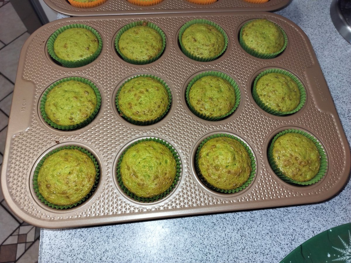 My cousin has a potluck at her work tomorrow and the theme is St Patrick's Day. So I baked 2 dozen pistachio cupcakes and I'll top them later with some pistachio frosting. These are fresh out the oven!