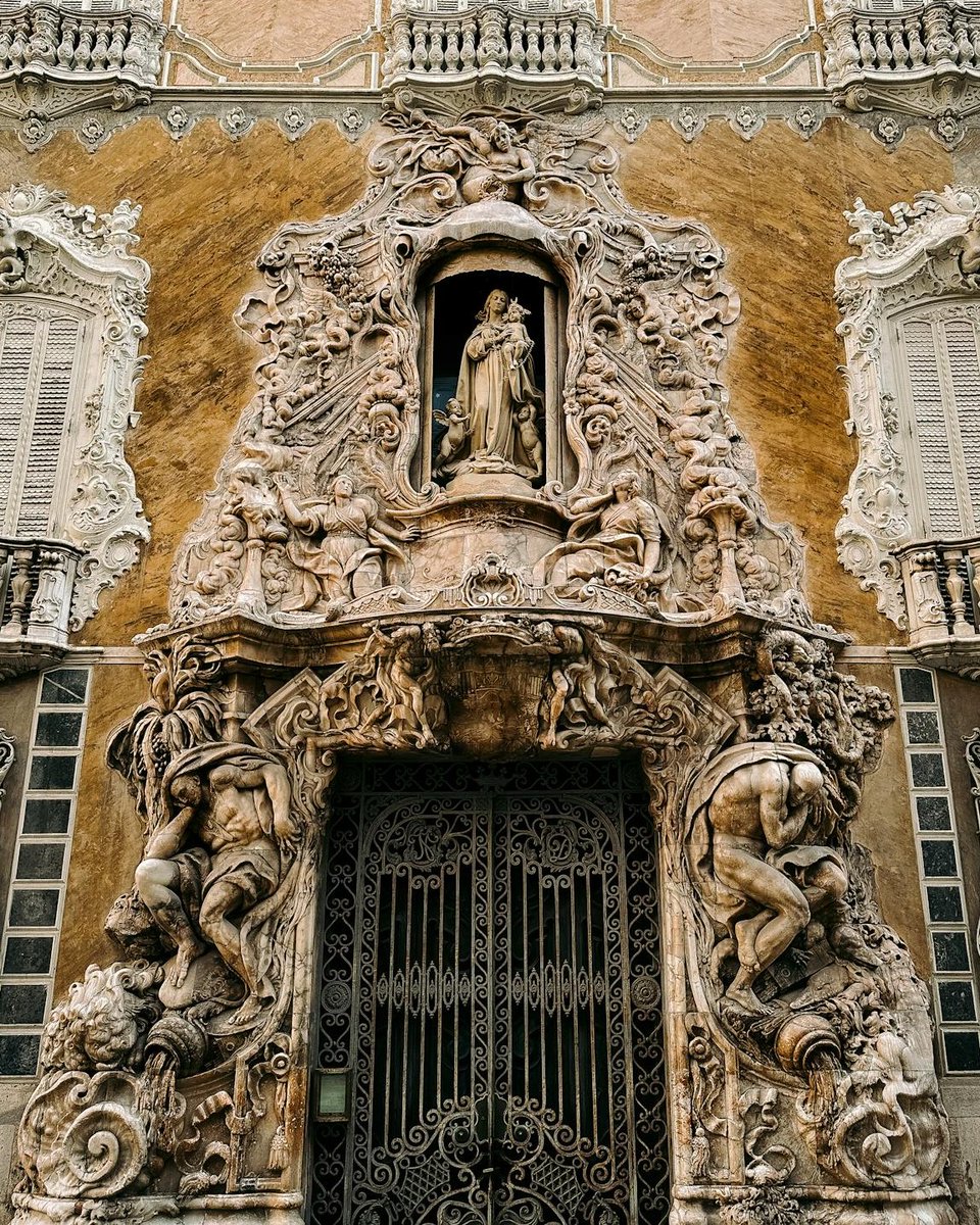 archpng's tweet photo. This is the alabaster entrance portal of the Palace of the Marqués de Dos Aguas in Valencia—carved in 1745 by Ignacio Vergara (from designs by Hipólito Rovira). Today, it’s home to the González Martí National Museum of Ceramics. https://t.co/zUqPan9wwG