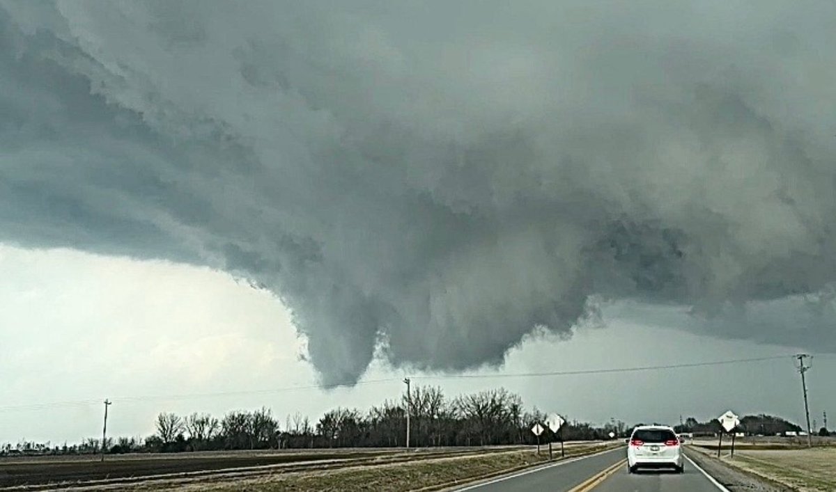 Tornado near Pontiac, IL 
Was spinning like a top and had ground circulation without a fully condensed funnel.