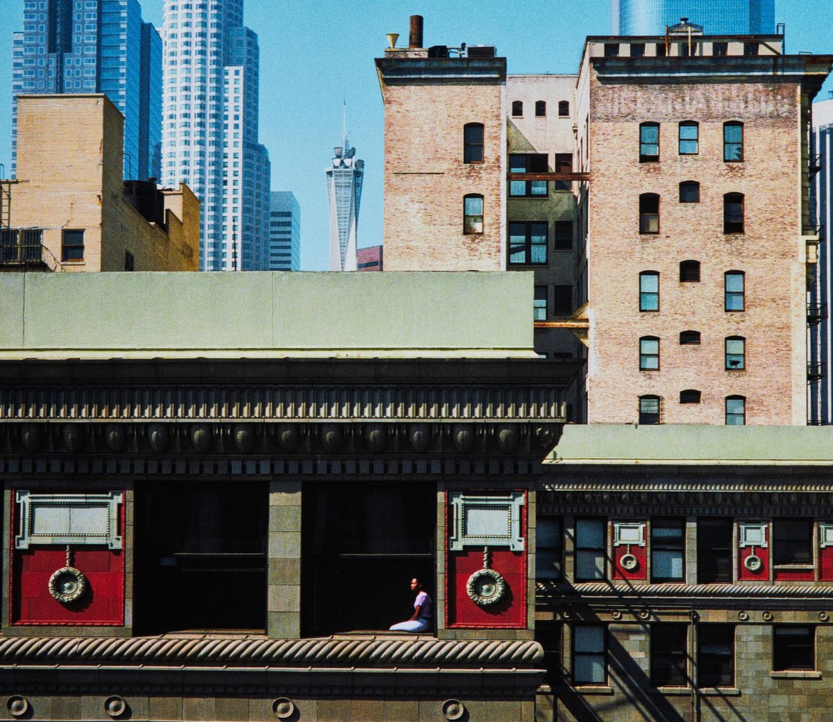 📷 Win Wenders. Girl in Window, Los Angeles, 1999.