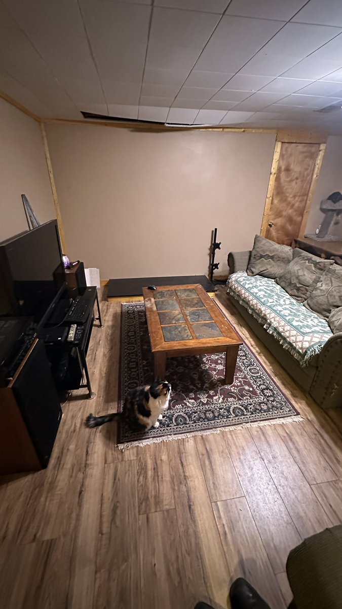 TheRealFedelta's tweet photo. So I reorganized my living room for a more cozy feel and I reckon I achieved that. I just need to figure out what to do with this open space (ignore the hole in the ceiling) https://t.co/F7HYOArg91