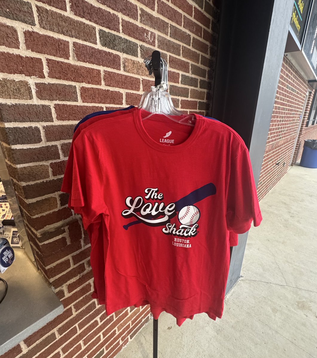 Micah_CBC's tweet photo. 🚨Baseball Specific Gear🚨

There were no game hats for sale, but you can get the “Love Shack” collection.

You can also have a Love Shack patch or Rally Train patch ironed on to any hat you buy! 

Incredible stuff @LATechBSB. https://t.co/oN7rVjp3US
