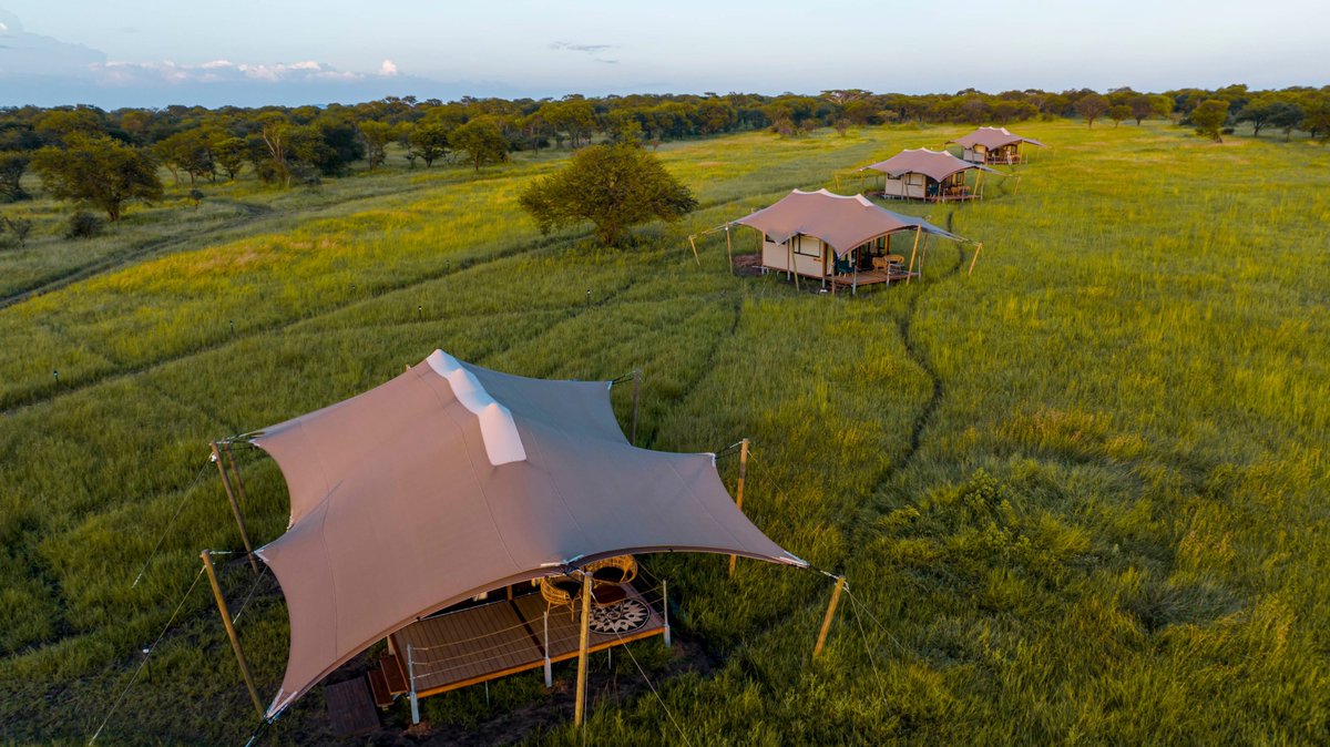 Luxury in the Wild!
   
Experience Escarpment Luxury Camp, Serengeti, the untamed beauty of Africa meets five-star comfort. Wake up to golden sunrises, roam with the Big Five, and unwind under a starlit sky. #Serengeti