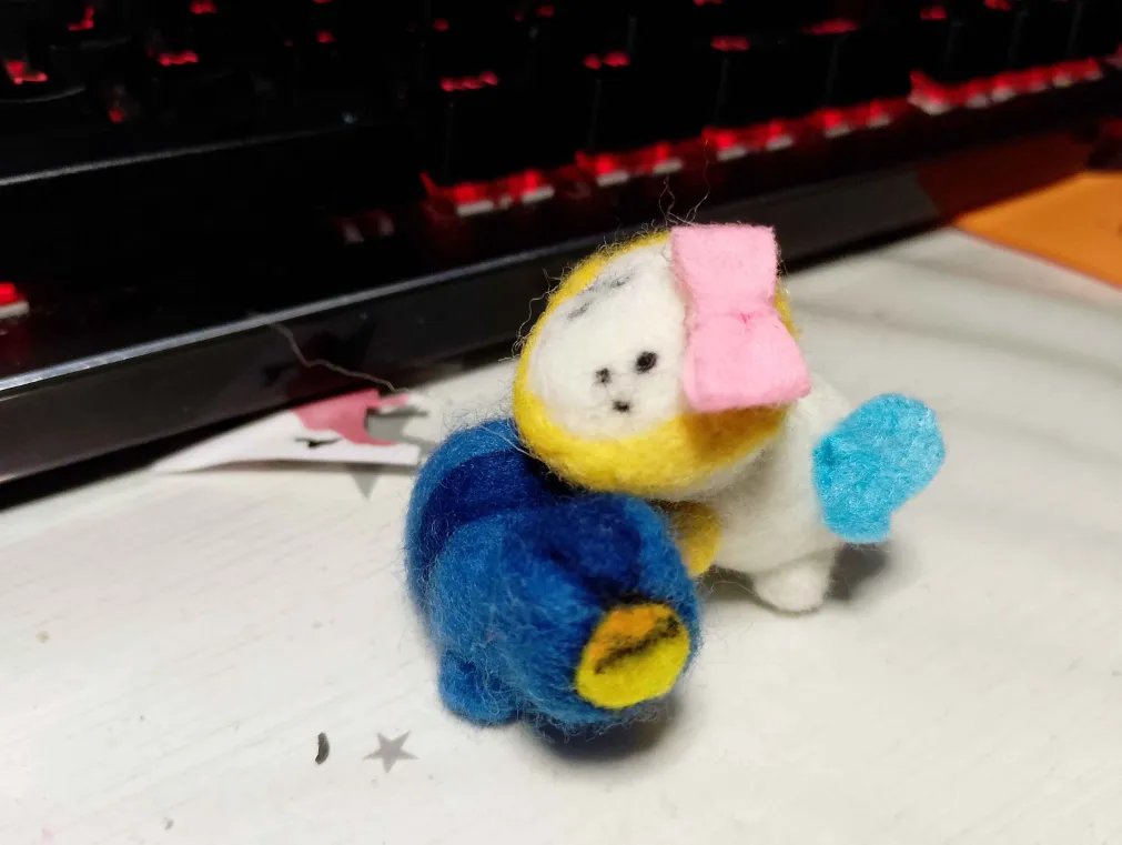 The_Bl0b_'s tweet photo. tiny needle felted power!! 

its not my best work but i still like it. made the head too big and messed up the face. oh well its ok!! its still cute as hell [ignore v1, power cant stand up on their own]
#ULTRAKILL https://t.co/NKKlDnrX3J