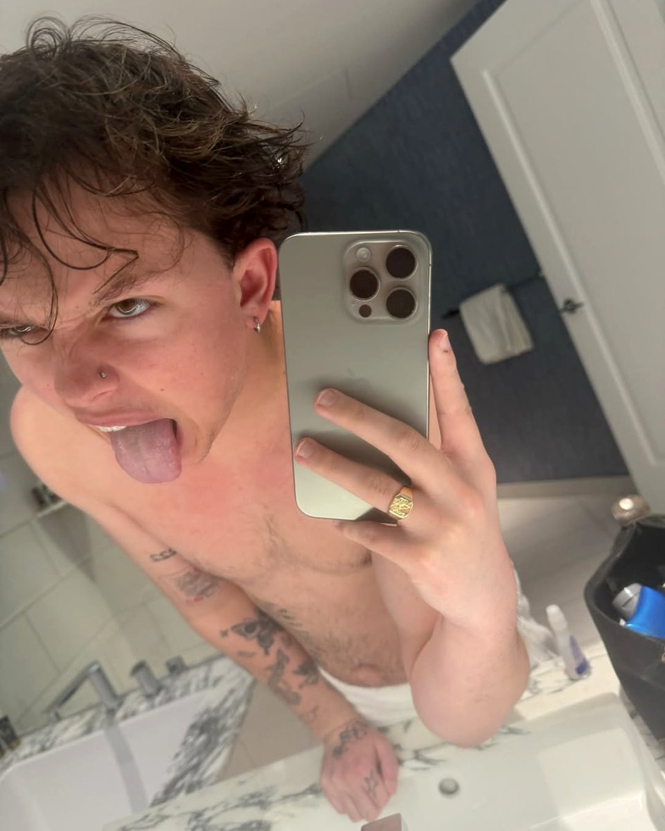 Scowling, tongue out, bucking wildly... was just how the twink behaved once he was stripped and shackled on stage at the pervy club, ready to be hooked up to a milking machine to have his virile balls vigorously pumped for jugloads of fresh cream for a leering crowd of horny men.