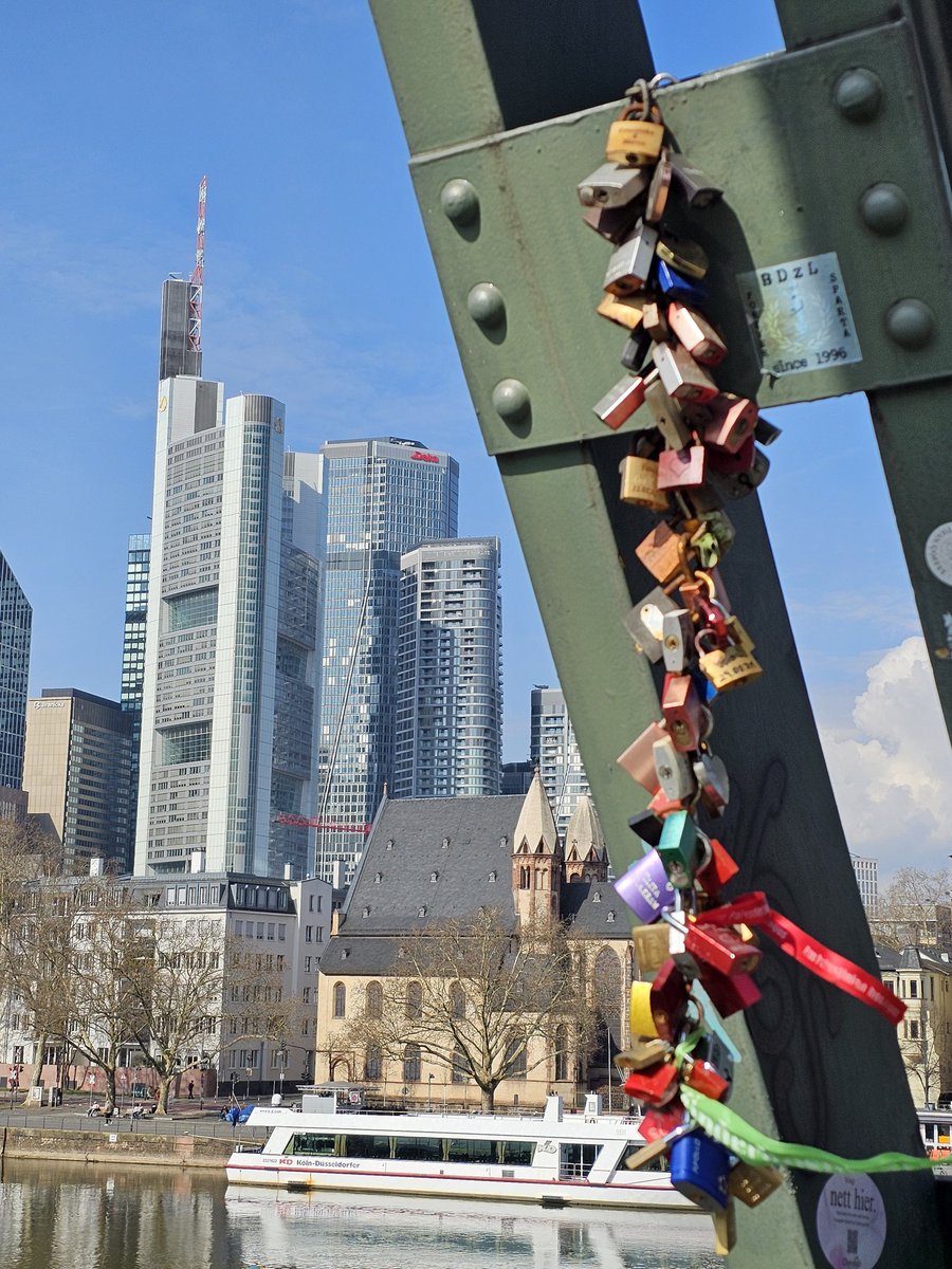 iron promises
of forever love
on a bridge

- KQ