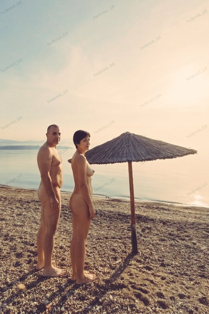 From last year's vibes: Nikos and Lena diving in au naturel for the first swim of the day, before the bustling beach wakes up. Who needs swimsuits?🇬🇷 #naturist #nudist #naturism #nudism #nudismo #fkk #couple #γυμνιστης #γυμνισμος #publicnudity #publicbeach #greece #eviaisland