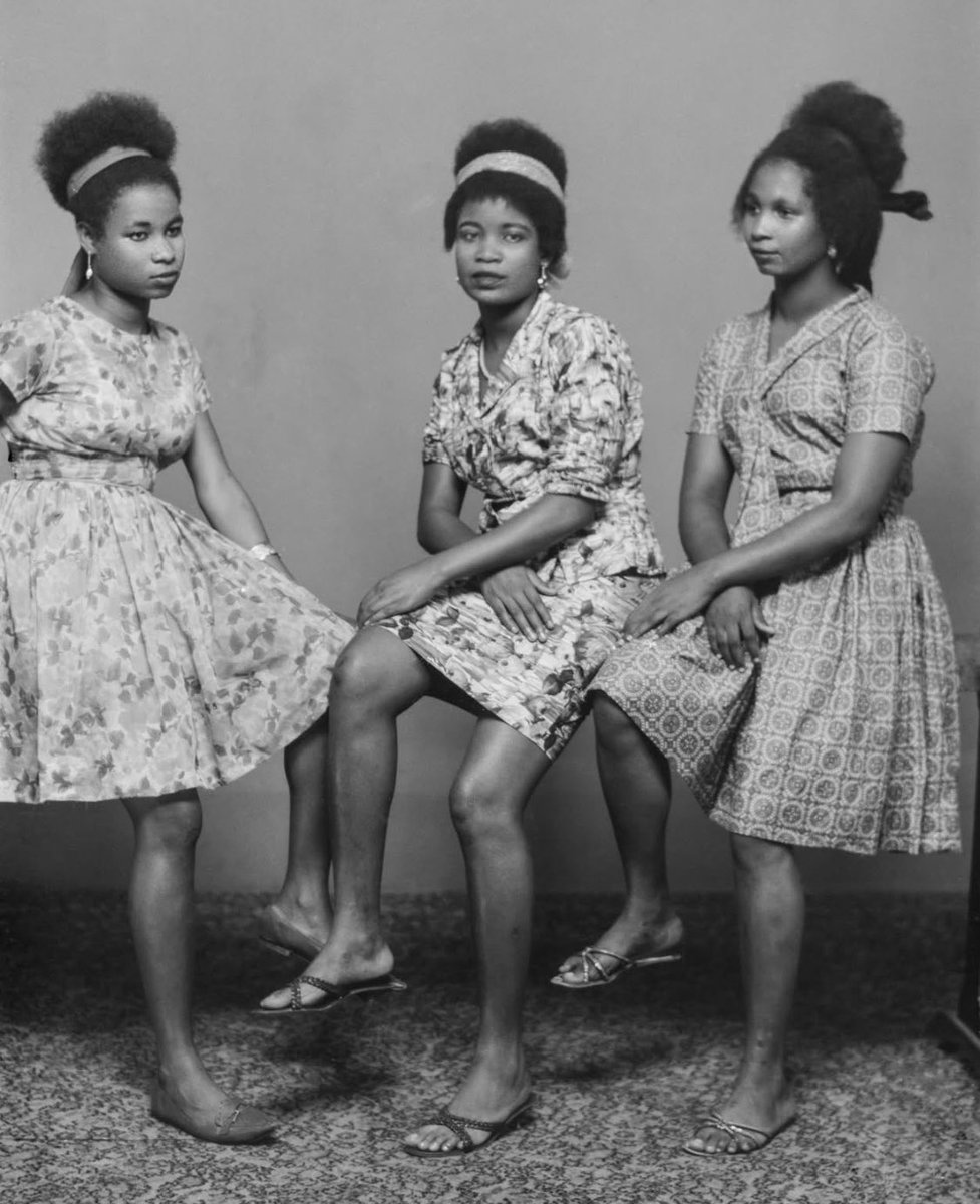 Nigerian women pose for a shot at a studio 

Nigeria, 1950’s

Simple and classy.