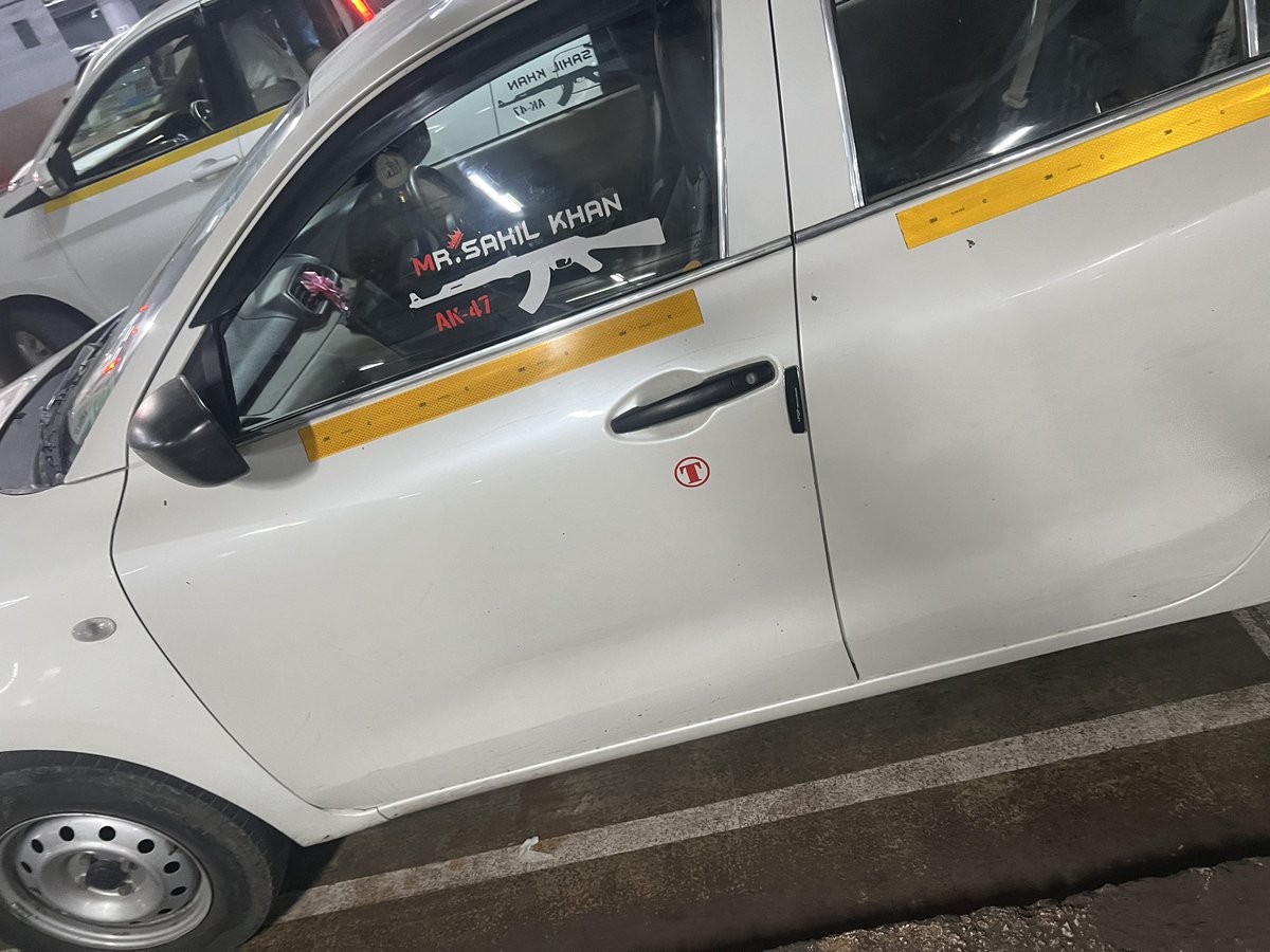 amitsurg's tweet photo. India is such a beautifully secular country that Ola cabbie Sahil Khan proudly roams around Mumbai with stickers of AK47 on his cab windows. https://t.co/GQyKFGn0C1