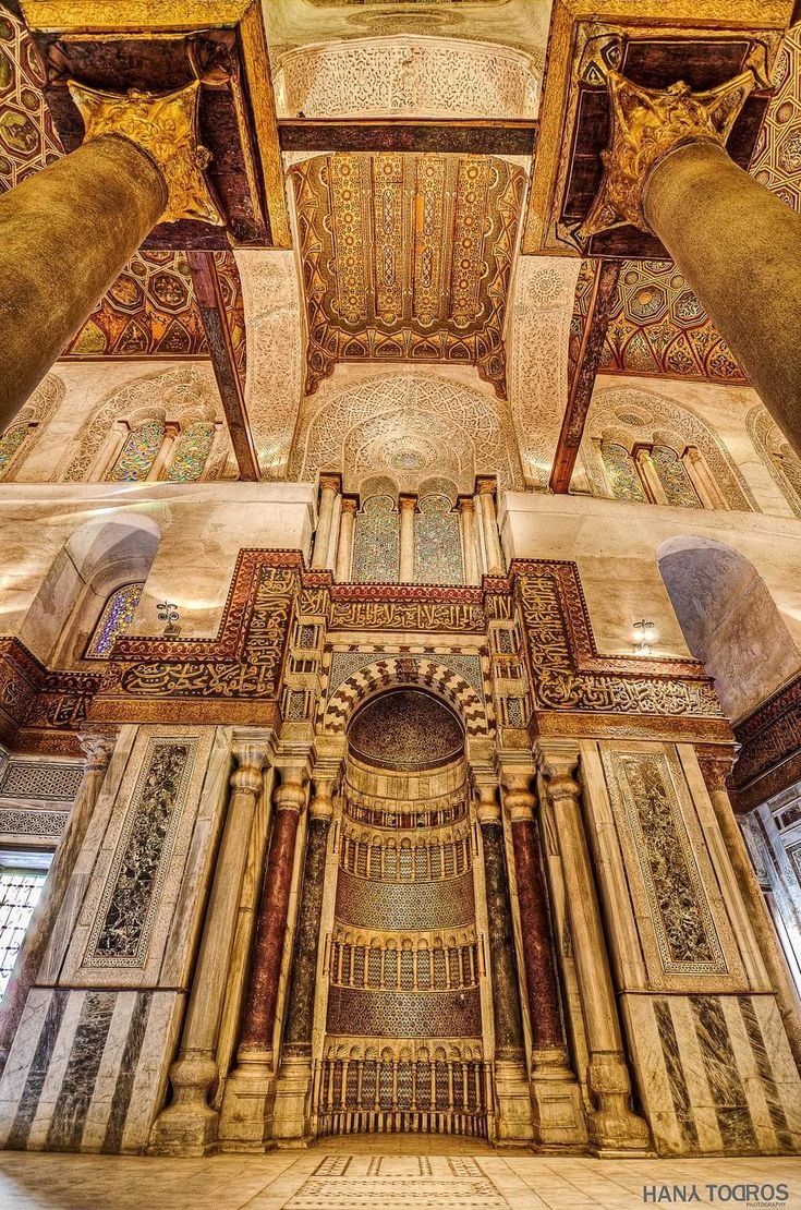 The ornate interior of the Mausoleum of Sultan Qalawun, located within the Qalawun Complex in Cairo, Egypt.