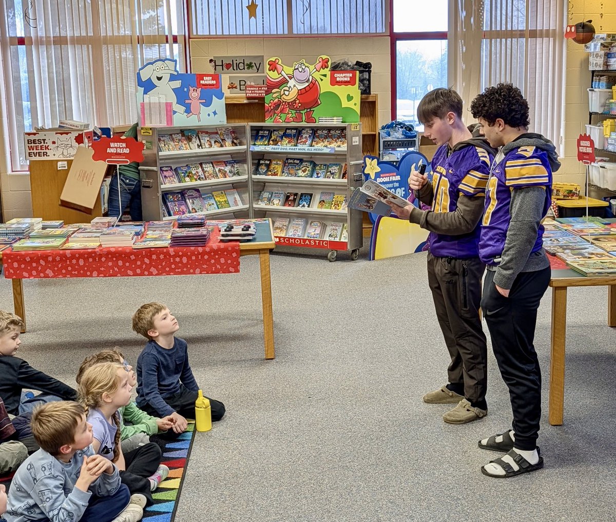 BCCFootball's tweet photo. MARCH IS READING MONTH — HAMPTON 📚

This afternoon we headed over to Hampton Elementary to read to all 17 classrooms as part of March is Reading Month. The guys also handed out Central Football wristbands to every student — which they were very excited about! https://t.co/jV7Oz8zzl5
