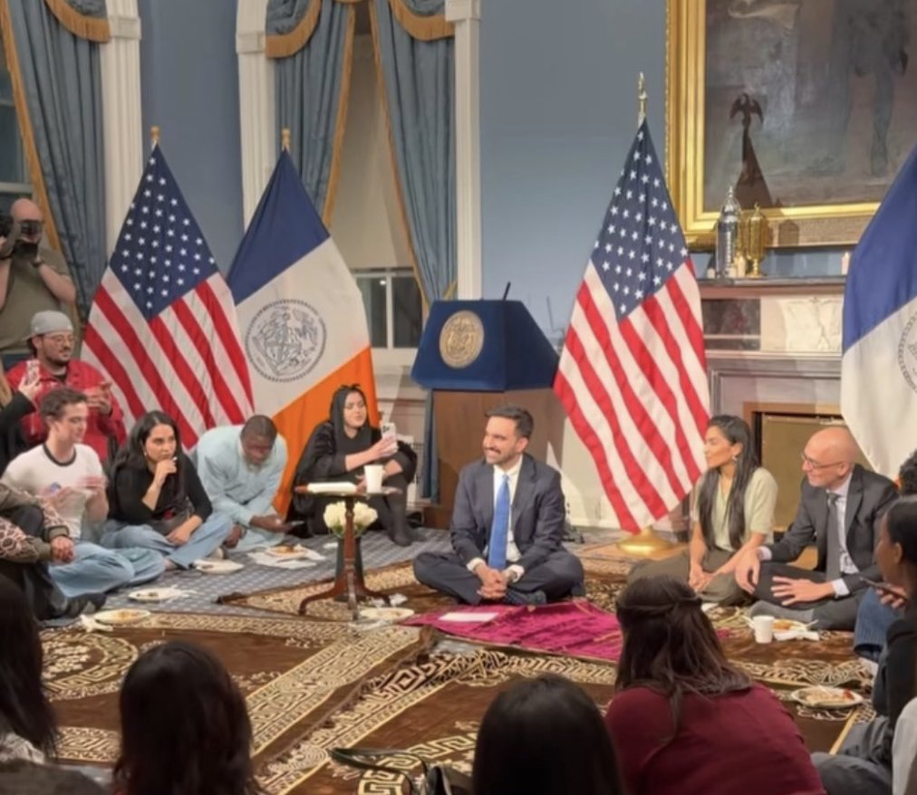 The Muslim mayor of New York City feasts on a meal barefoot and sitting on rugs inside City Hall nearly 25 years after Muslims waged jihad in the Big Apple and killed thousands of our fellow countrymen.