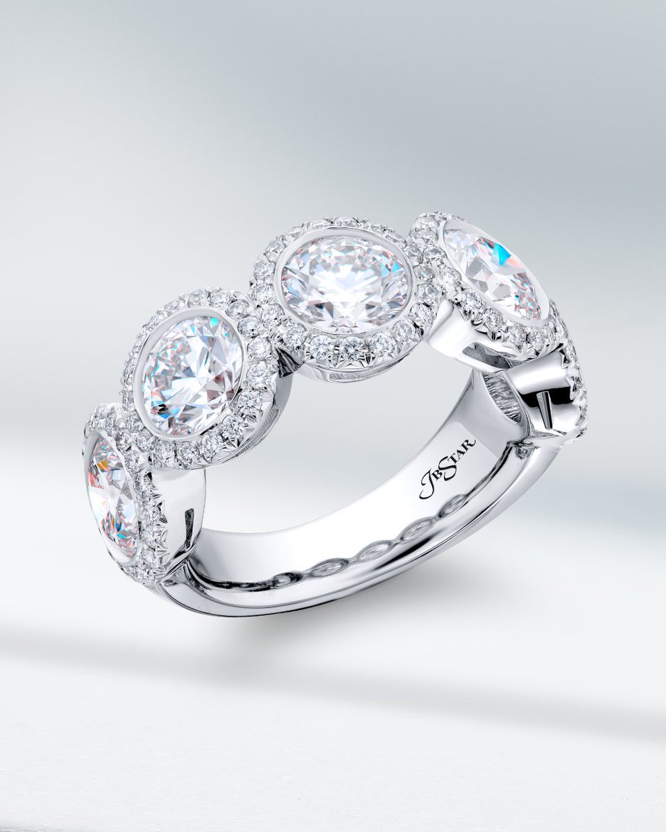 Dive into elegance with our diamond bezel band! This stunning band features five gorgeous round diamonds embraced by micro pave diamonds and pure platinum. (Style 5308-005)
.
.
#jbstar #highendjewelry #diamond #bezelset #LuxeLiving