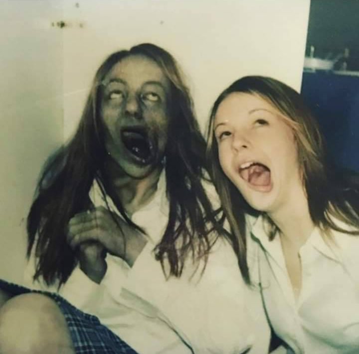 Amber Tamblyn posing with her dead self on the set of THE RING (2002)