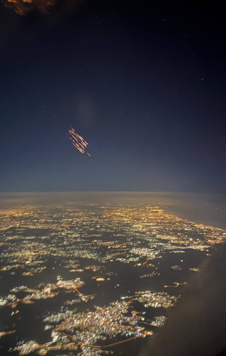 Iranian ballistic missiles as photographed from the cockpit of a plane.