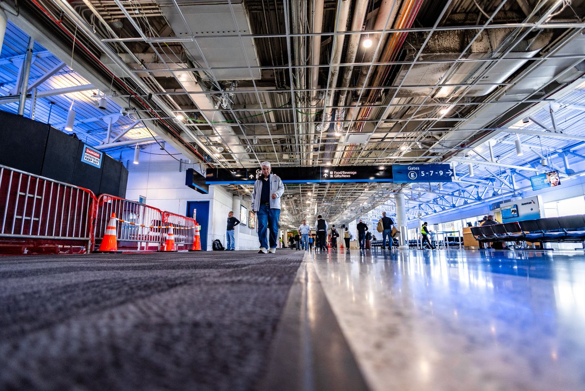 CLTAirport's tweet photo. CLT’s busiest concourse is transforming!

Concourse E renovations include new terrazzo flooring, modernized wayfinding, gate renumbering, upgraded flight displays and added moving walkways.

Estimated completion spring 2027. https://t.co/GsSSlpeBT3