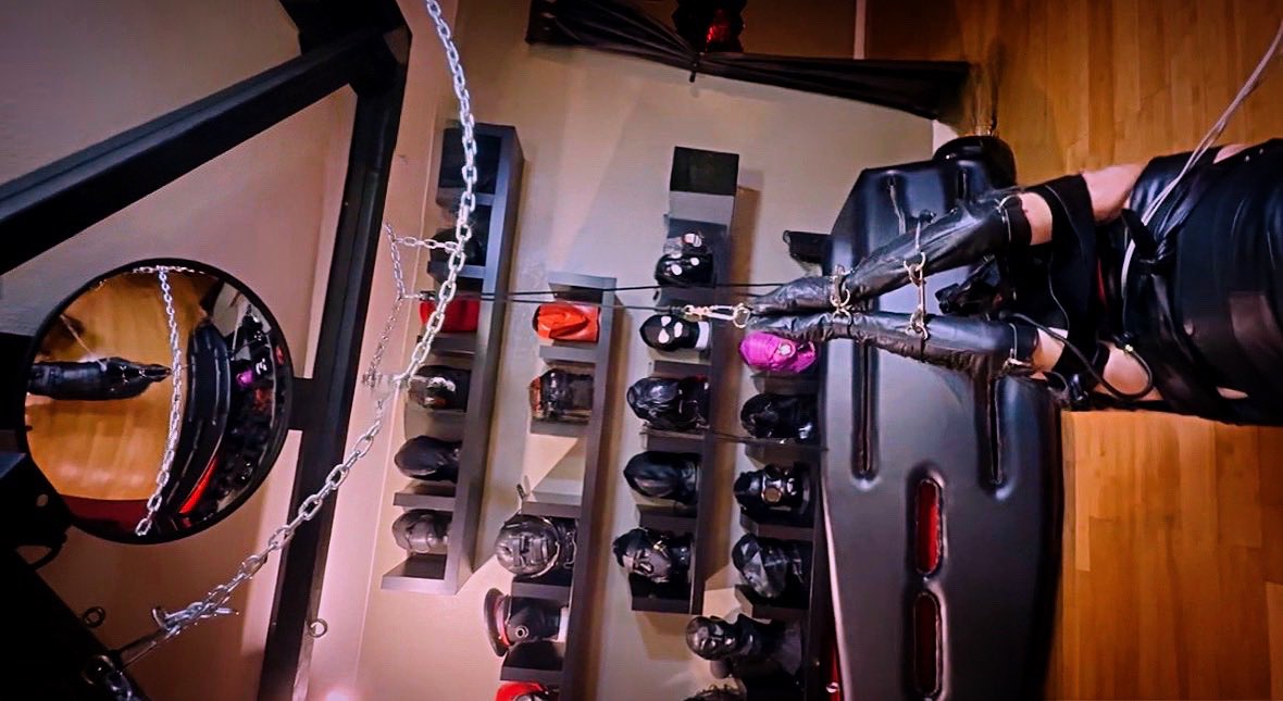 Lady Bridget and Lady Sindy Ballard with their slave, Bootsub212. He is fully in leather, from leather belts to boots, even his arms are encased in the warm, restrictive leather.
Two MK-312BT Power Units run to his body, taking him on a ride of waves moving between ecstatic
