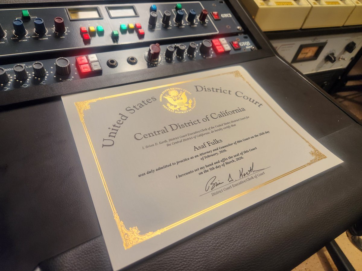 Federal court admission certificate arrived. Sitting right where it belongs — on top of 20 years of studio gear. Two careers, one desk.