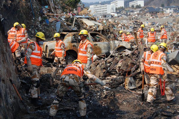 IndianEmbTokyo's tweet photo. Fifteen years since the devastating earthquake and tsunami in Tohoku region, @IndianEmbTokyo remembers the lives lost and destruction that unfolded. Japan was not alone that day. India’s NDRF worked with our Japanese friends on their first ever overseas operation for relief work. We remember and commemorate the cooperation between our people and government.