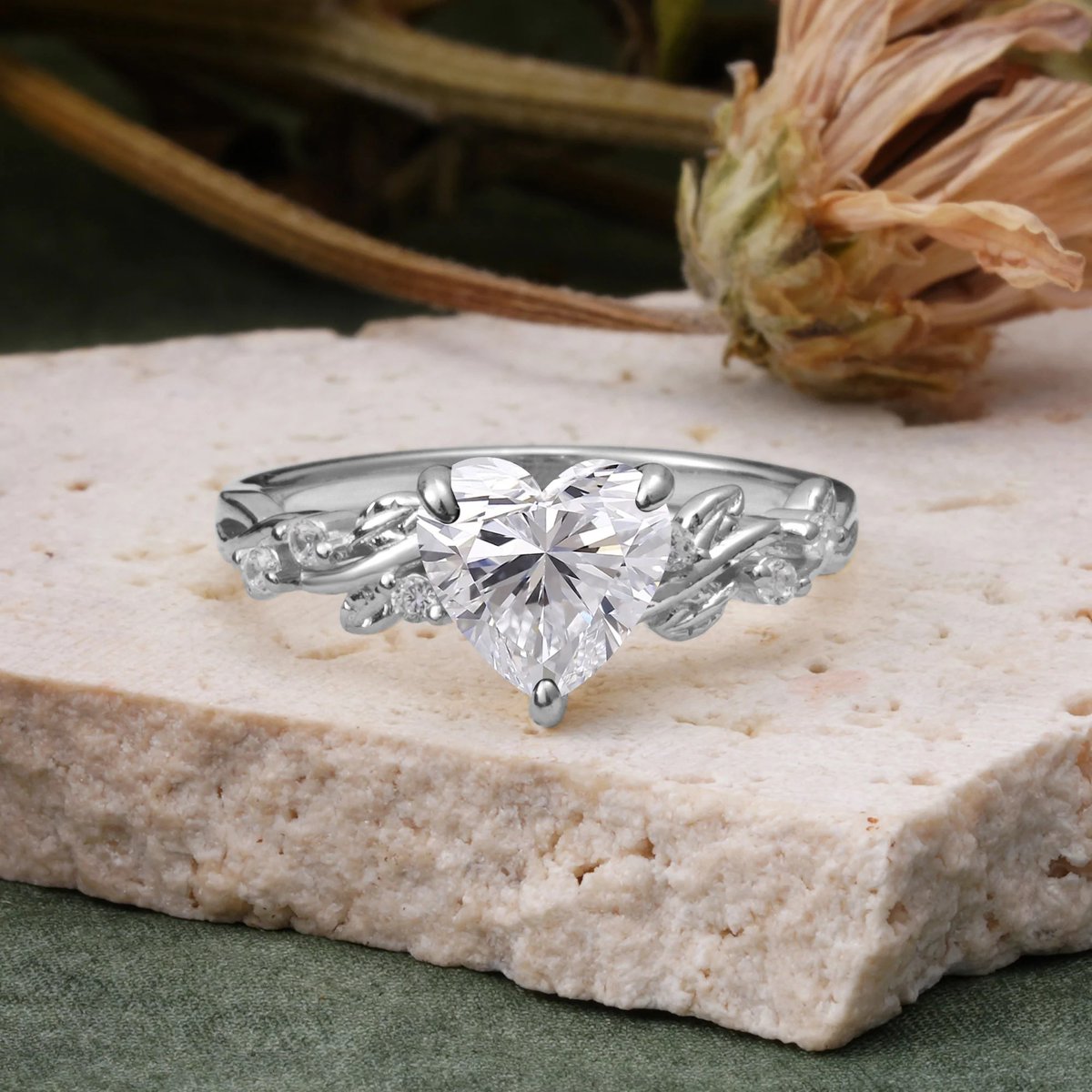 Romalarjewelry's tweet photo. Peak lover girl aesthetic. 🎀🌿 A classic Heart Moissanite meets the prettiest leaf details. We are obsessed. #HeartRing #ROMALAR https://t.co/qpTSQzV8TF