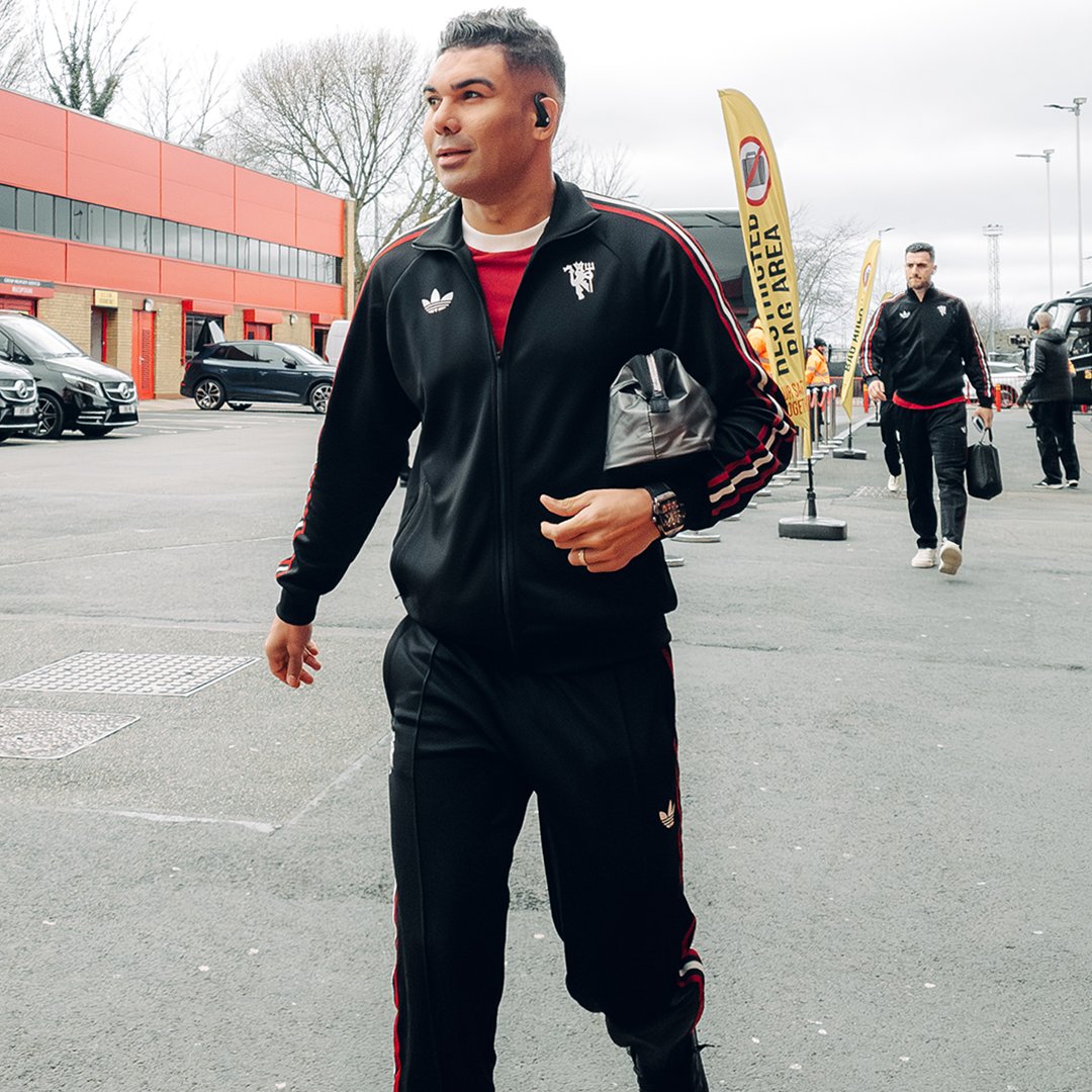 ManUtd's tweet photo. The adidas Originals track top and pants are 🔥🖤